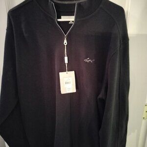 Greg Norman black shirt